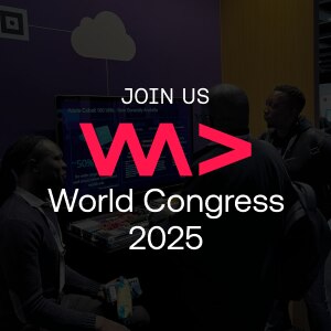 Group of people at a tech booth with overlay text: Join us – WAD World Congress 2025.