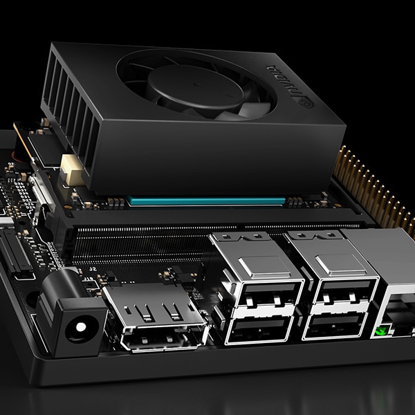 NVIDIA Jetson Nano development board with cooling fan and various ports.